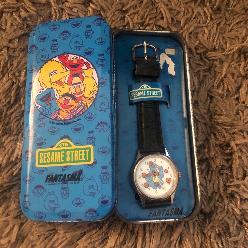 Vintage Sesame Street Blue Tin Watch with Black Strap. Will need battery